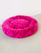 Swirl round dog bed - magenta